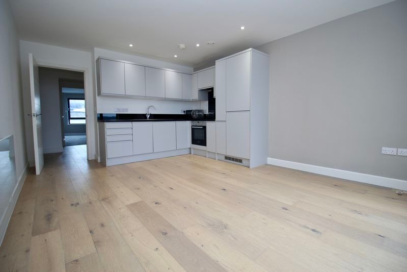 Property photo 1 of 7 Kitchen/Living Area