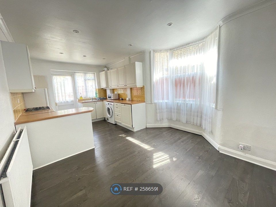 Property photo 3 of 12 Kitchen With Dining Space