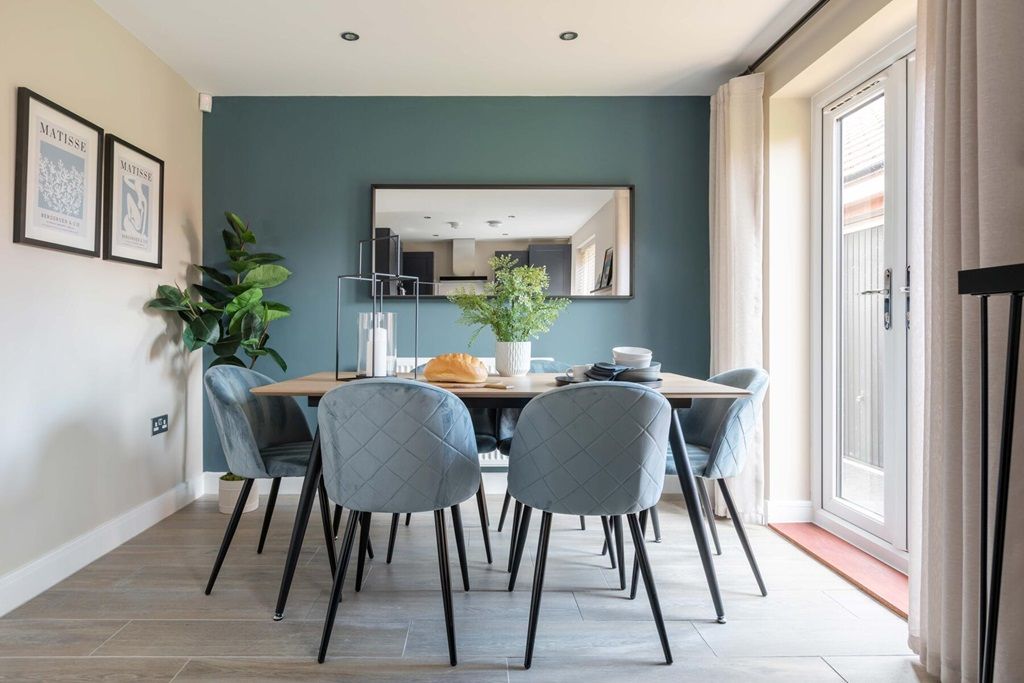 Property photo 3 of 12 The Dining Area Is Perfect For Entertaining Family And Friends