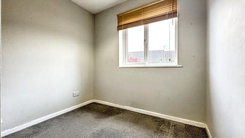 Property photo 1 of 14 A Small, Neutral-Colored Room With A Single Window...