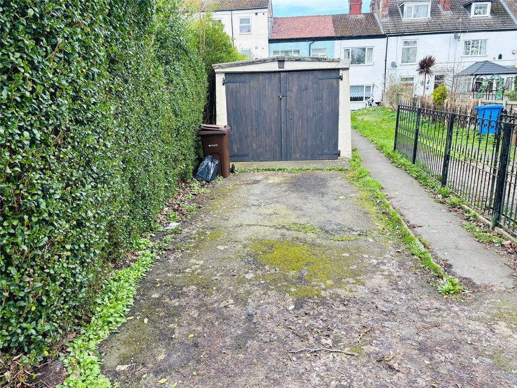 Property photo 2 of 12 Garage