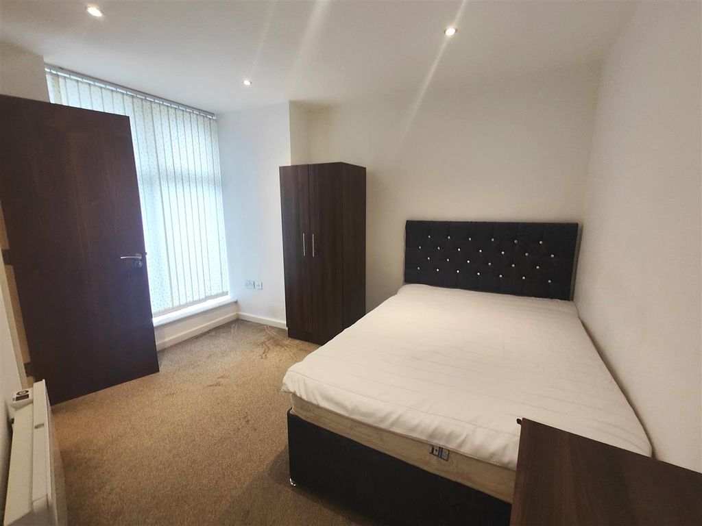 Property photo 3 of 8 Bedroom One