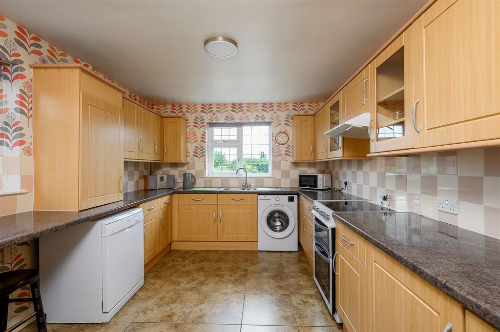 Property photo 3 of 16 Kitchen