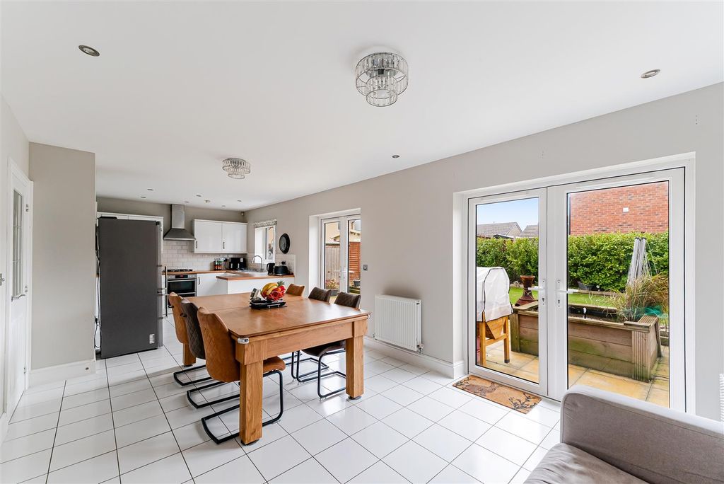 Property photo 2 of 25 Kitchen/Dining/Family