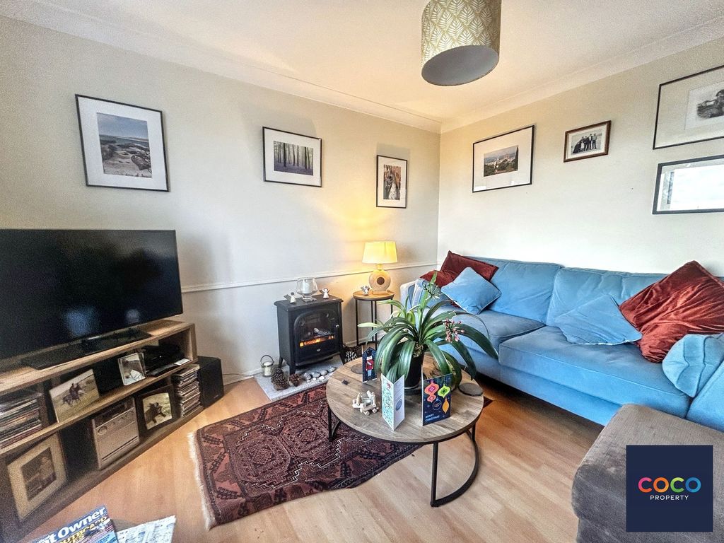 Property photo 2 of 10 Living Area