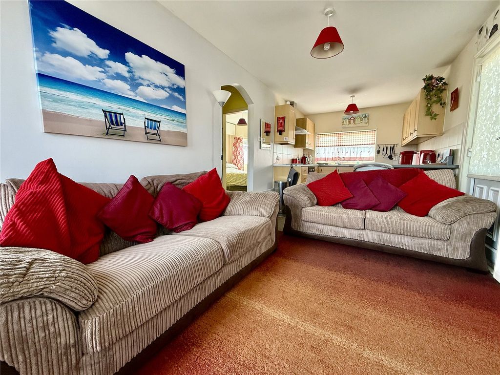 Property photo 2 of 11 Living Area