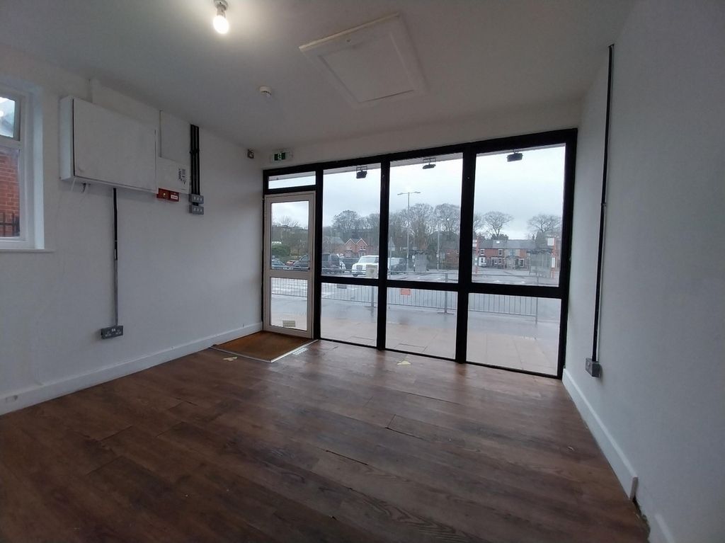 Property photo 2 of 2 The Front Of An Arch, With A Fully Glazed Frontage And Door Allowing You To See Into The Arch Interior.