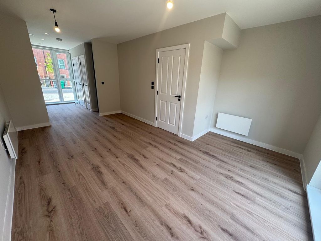 Property photo 3 of 11 Living Area