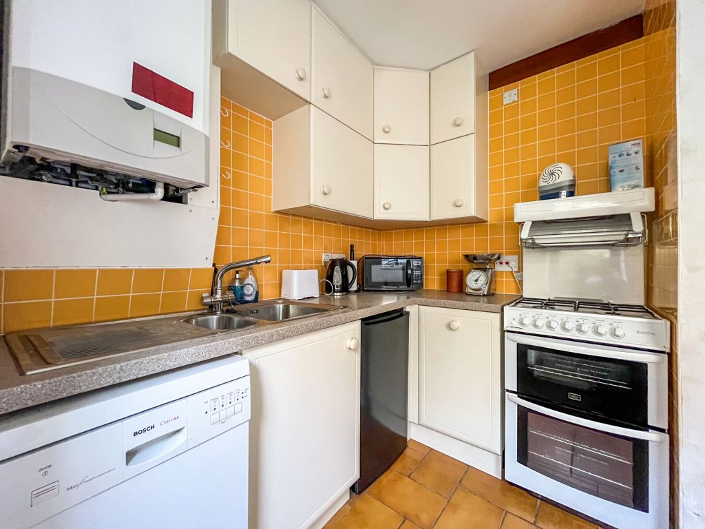 Property photo 3 of 8 Kitchen Area