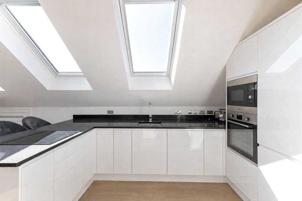 Property photo 3 of 8 Kitchen