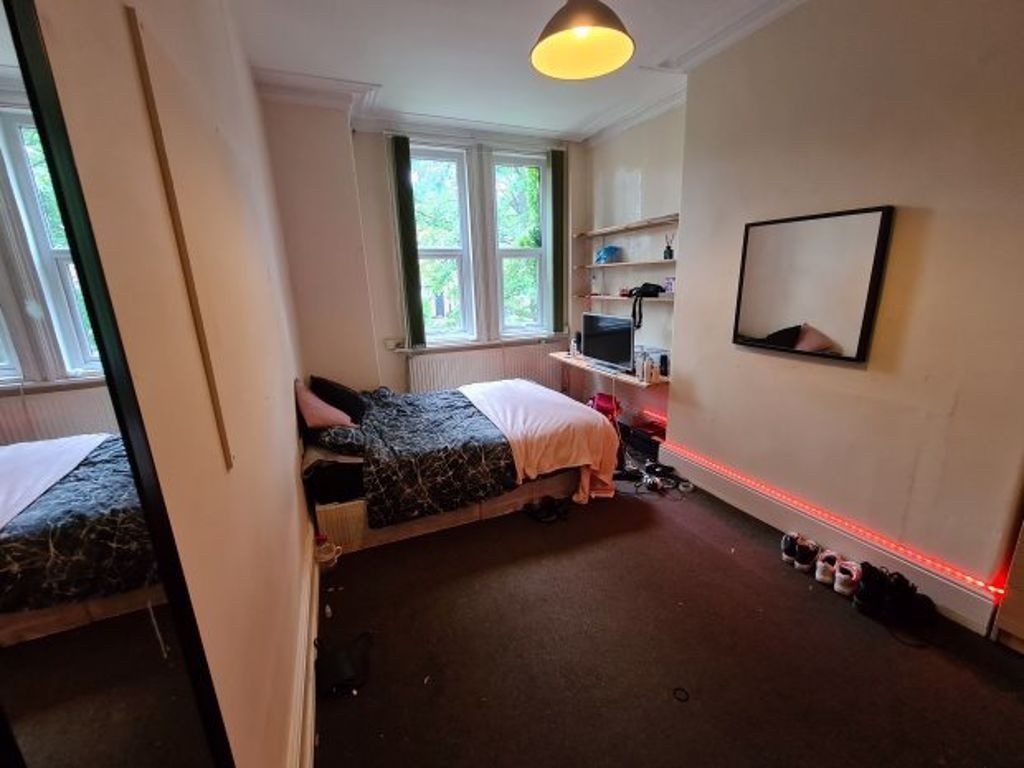 Property photo 2 of 10 A Cozy Single Bedroom Featuring A Bed, A Window Al...