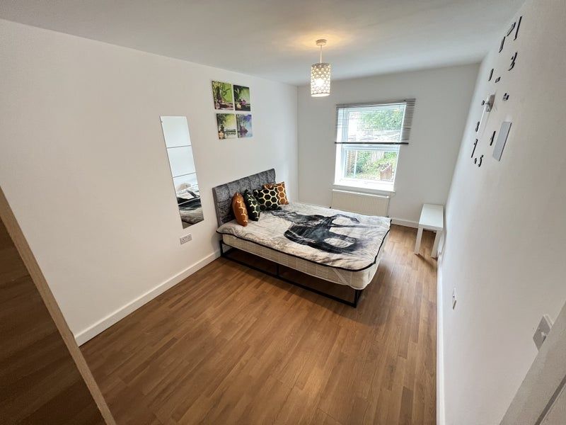Property photo 2 of 7 Bright And Tidy Double Bedroom Featuring A Comfort...