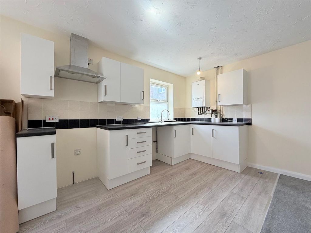 Property photo 3 of 9 Kitchen Area
