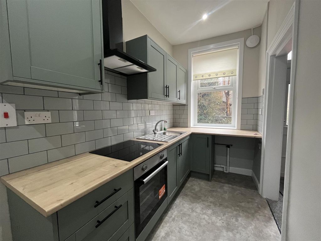 Property photo 2 of 12 Kitchen