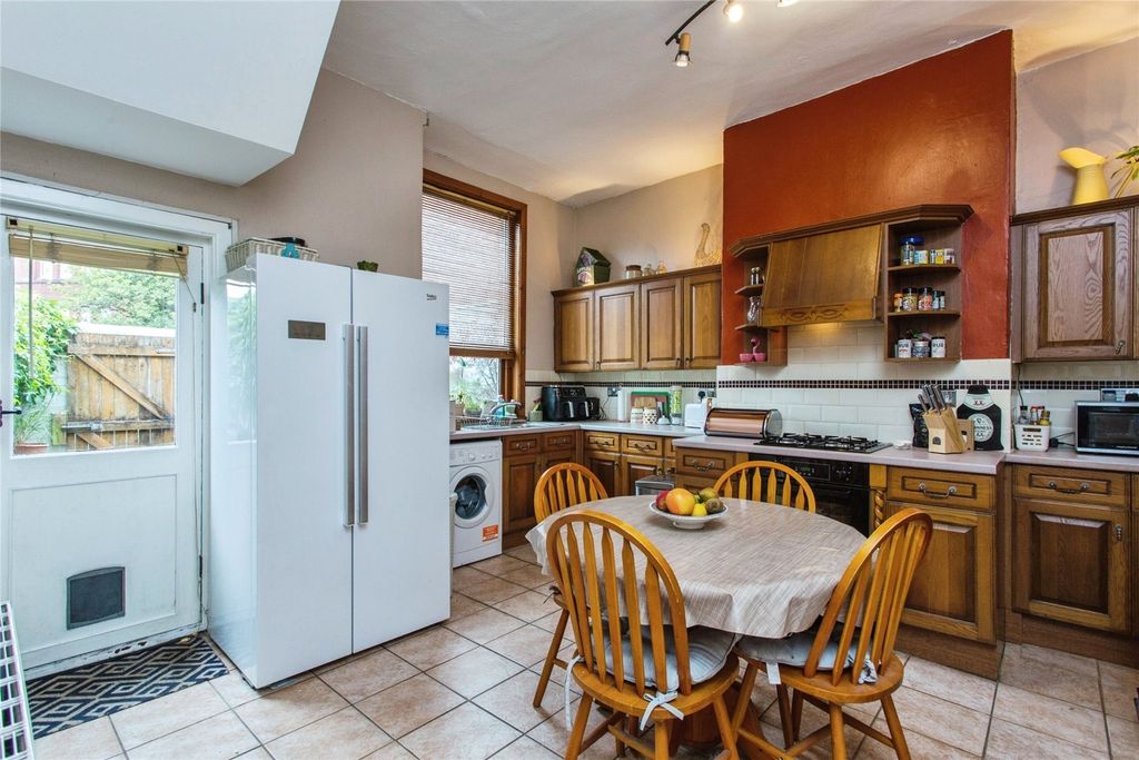 Property photo 3 of 17 Dining Kitchen