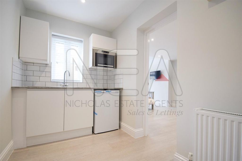 Property photo 2 of 11 Kitchen/Living Room