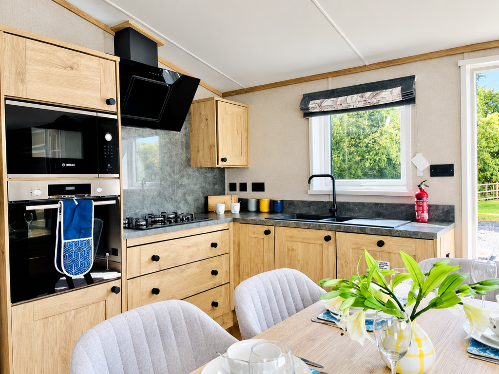 Property photo 3 of 5 Modern Fitted Kitchen With Integrated Appliances And Wood Effect Cabinetry
