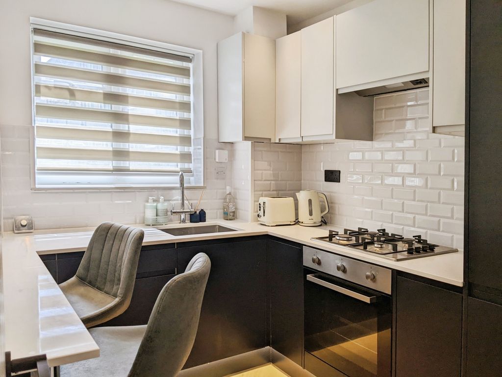 Property photo 3 of 8 Kitchen
