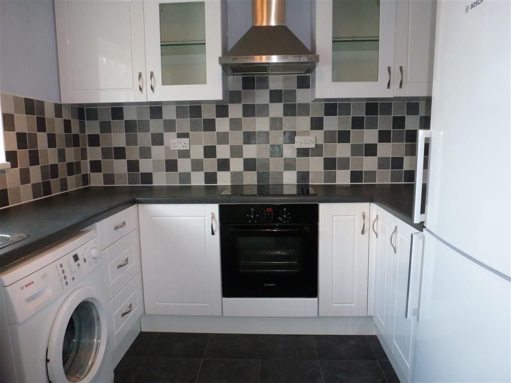 Property photo 1 of 8 Kitchen