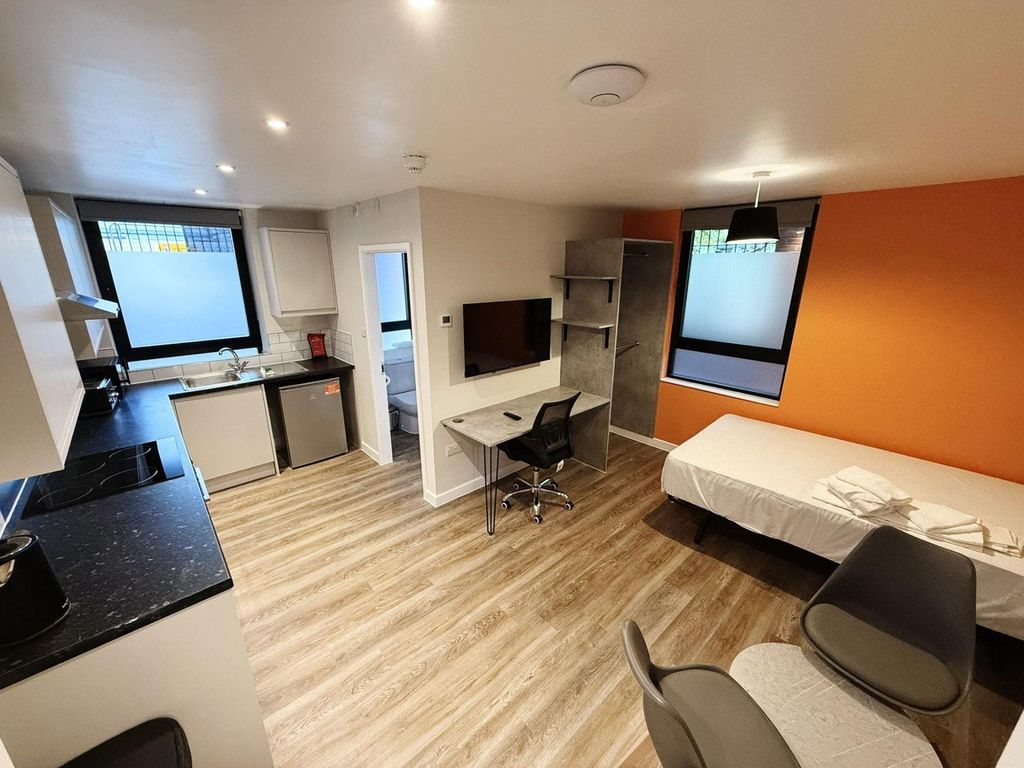 Property photo 1 of 7 A Spacious And Modern Living Area With Ample Natur...