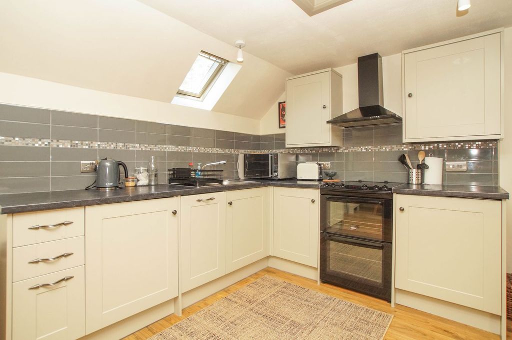 Property photo 3 of 13 Kitchen Area