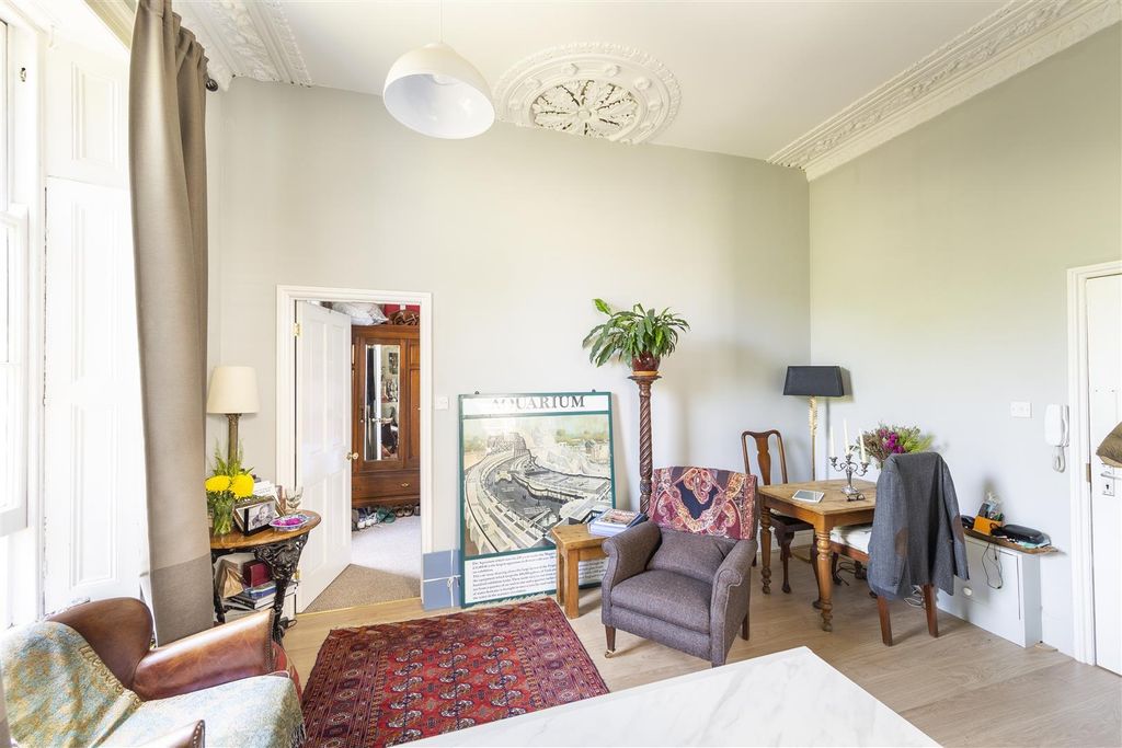 Property photo 3 of 7 Bright Lounge With High Ceilings And Dining Nook...