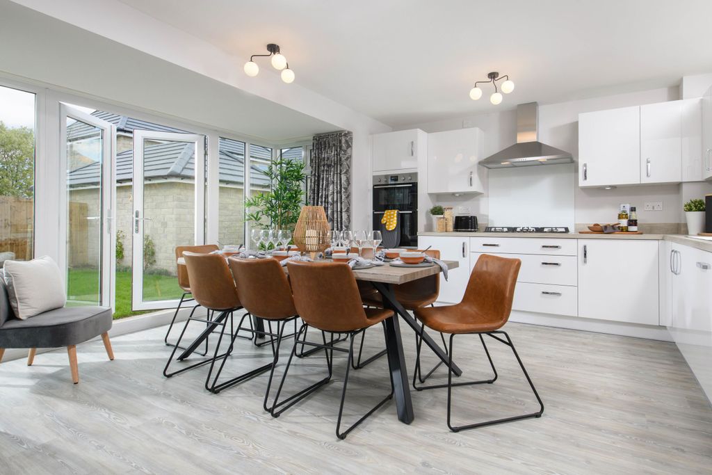 Property photo 2 of 10 Open-Plan Kitchen/Dining Area With Glazed Bay Leading Onto Garden - Millford Style Home