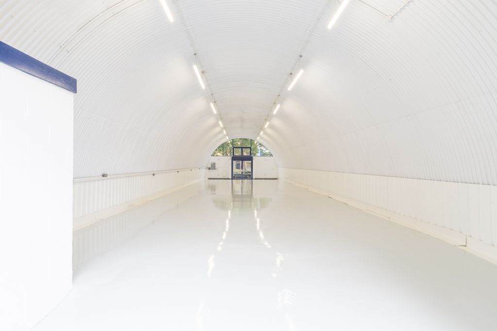 Property photo 3 of 4 An Empty Arch With White Lining And A WC Cubicle To The Back.