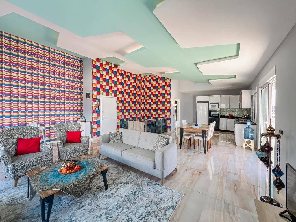 Property photo 3 of 25 Sea View Penthouse Apartment For Sale In Mahmutlar - Open-Plan Living Area