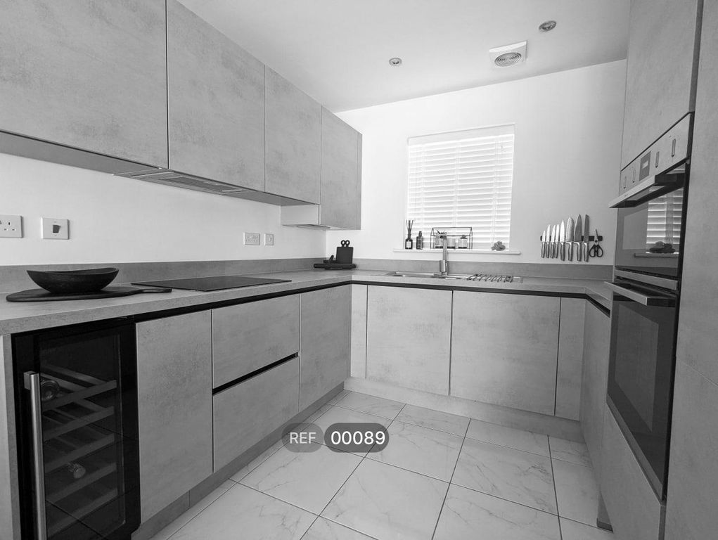 Property photo 1 of 8 Kitchen & Living Area