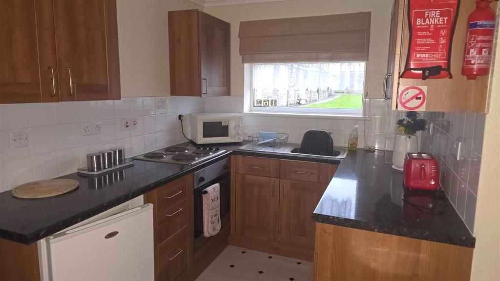 Property photo 3 of 8 Kitchen