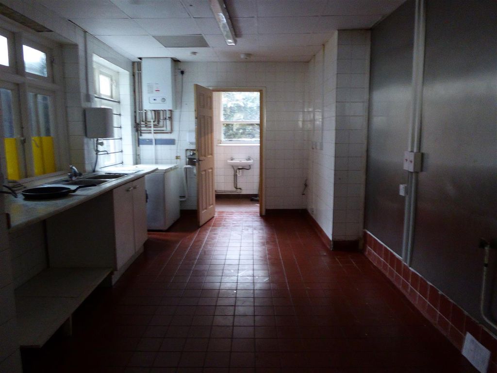 Property photo 3 of 7 Kitchen Area