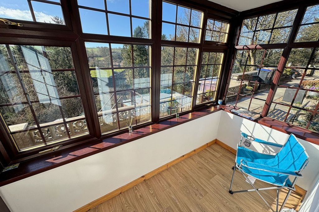 Property photo 2 of 13 Sun Room