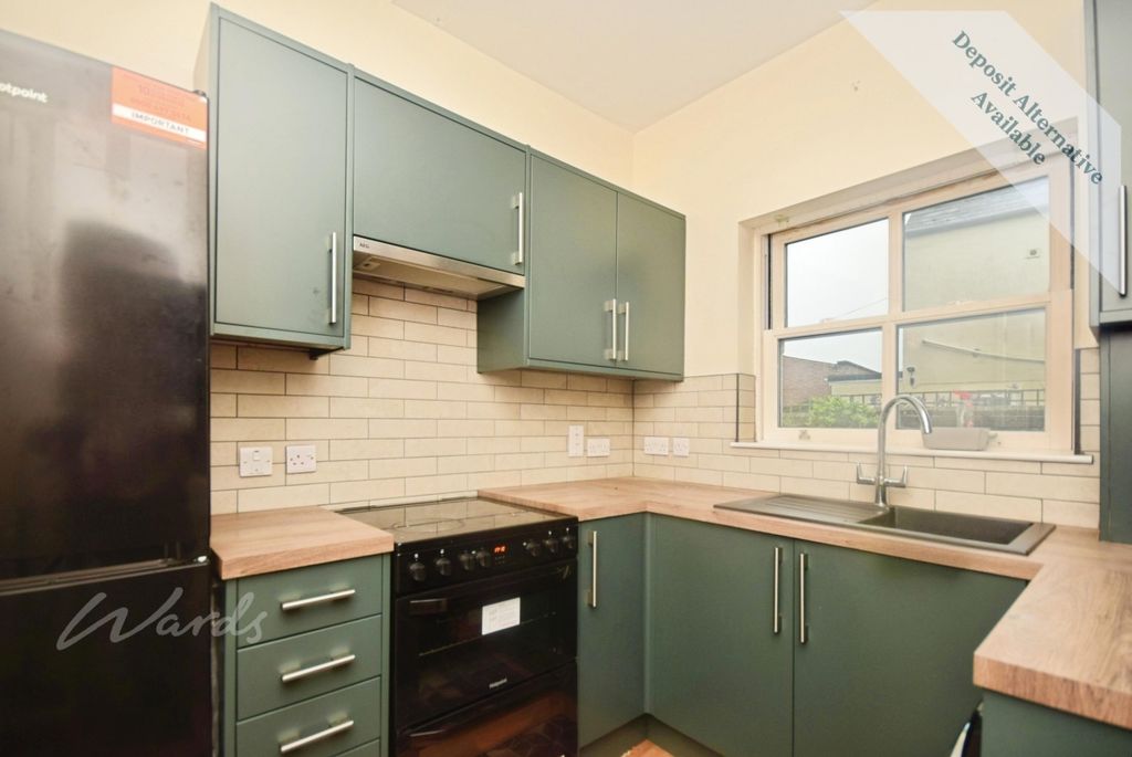 Property photo 2 of 12 Kitchen