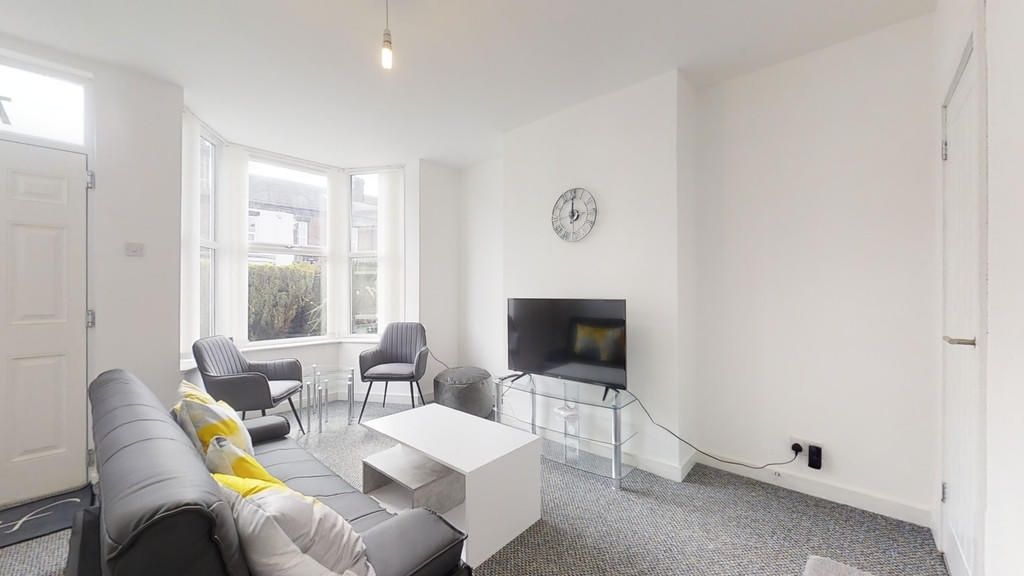 Property photo 3 of 10 Bright And Contemporary Living Room Featuring A Co...