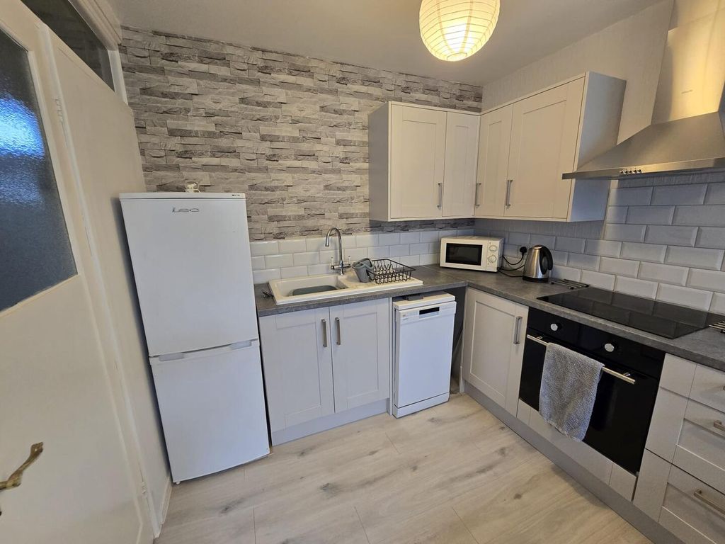 Property photo 2 of 12 Kitchen