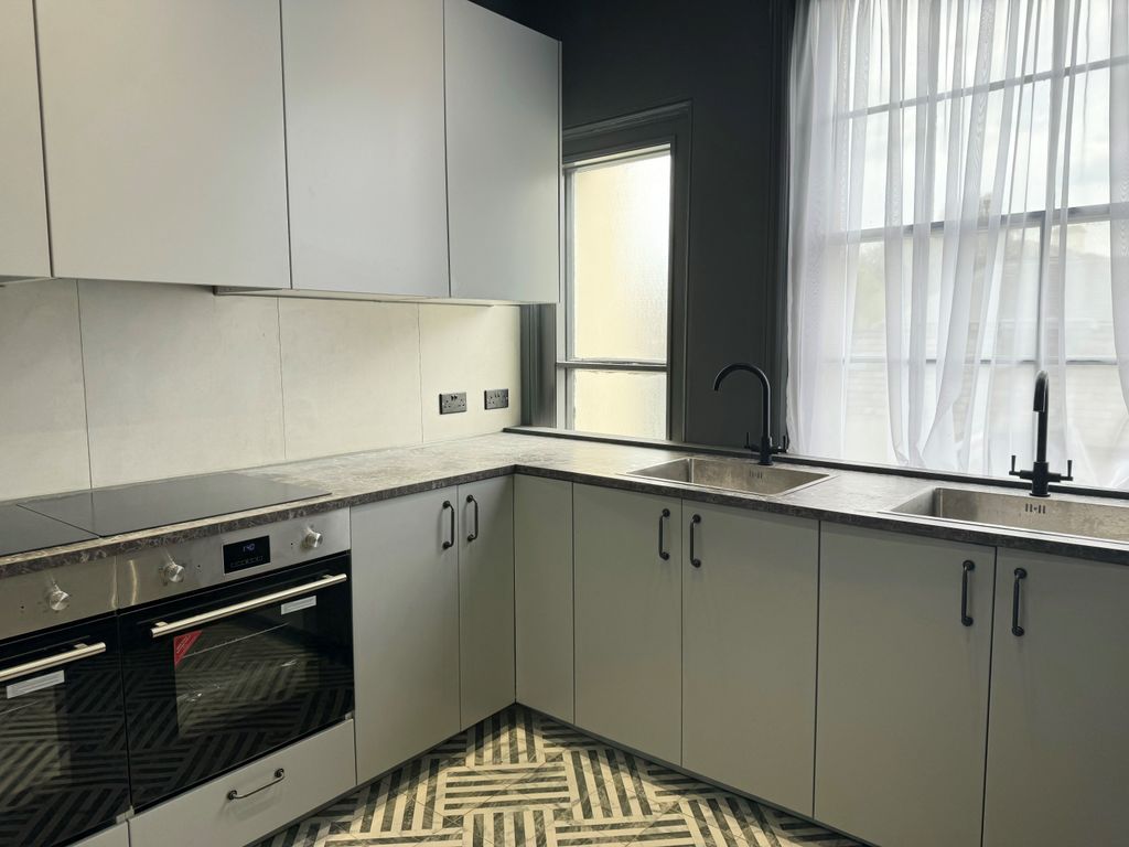 Property photo 3 of 4 Kitchen