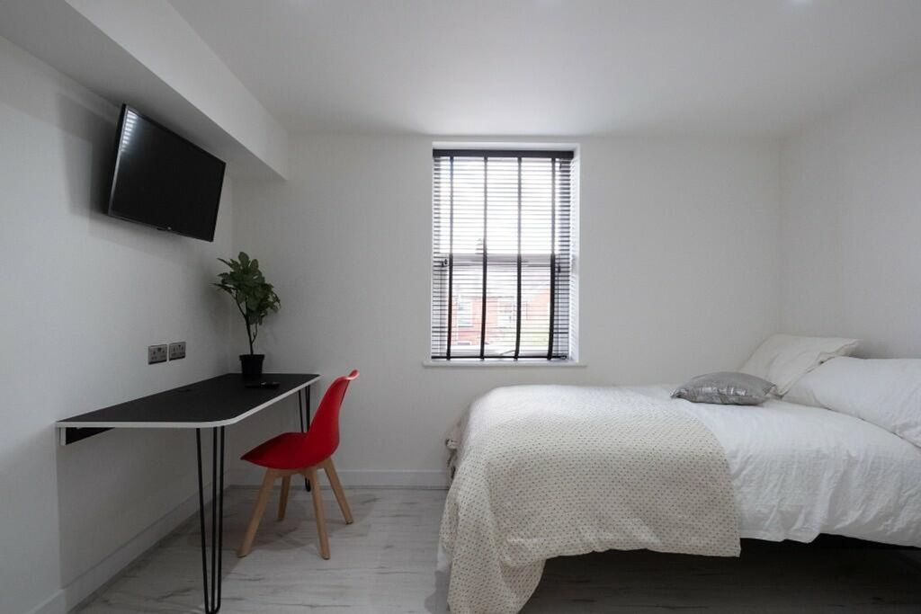 Property photo 2 of 14 This Stylish Double Bedroom Features A Comfortable...