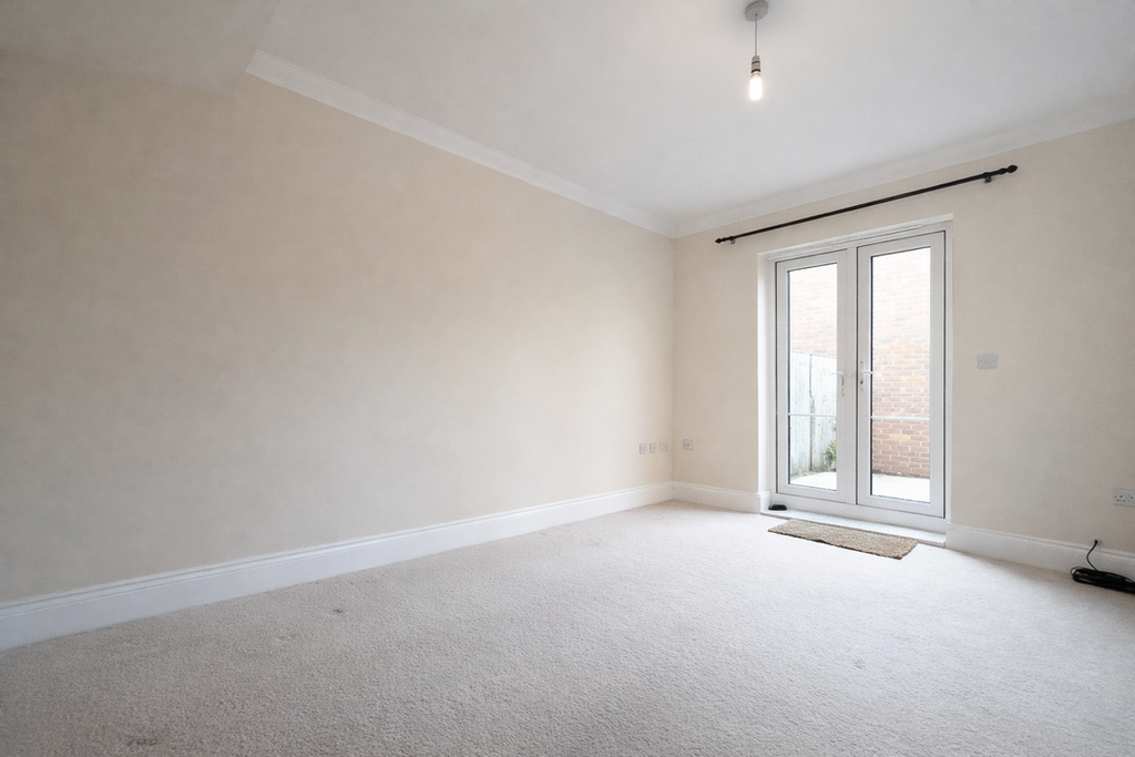 Property photo 3 of 9 Emptylivingroomwithfrenchdoors