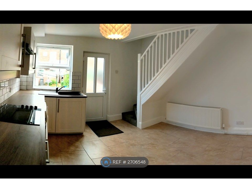 Property photo 3 of 13 Dining Kitchen