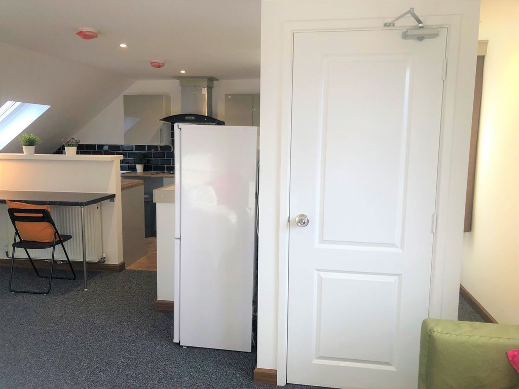 Property photo 3 of 12 Bright And Modern Kitchen Area Featuring A Clean W...