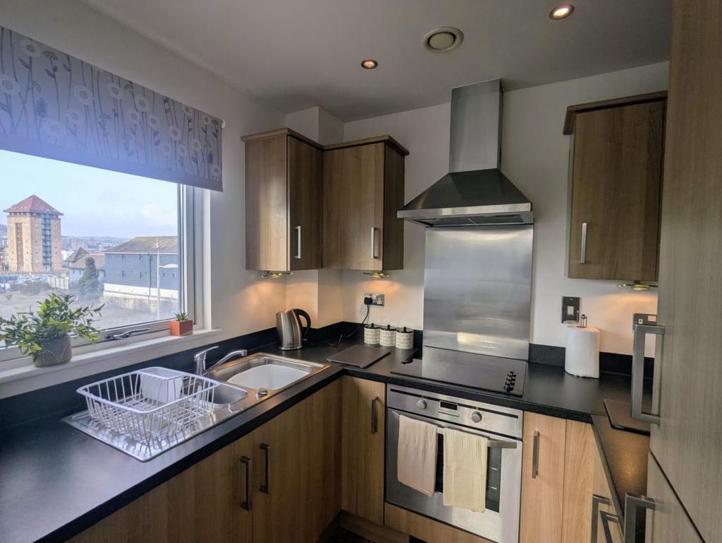 Property photo 2 of 12 Kitchen