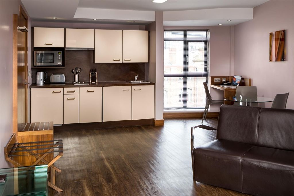 Property photo 2 of 6 Modern Open Plan Kitchen With Sleek Appliances...