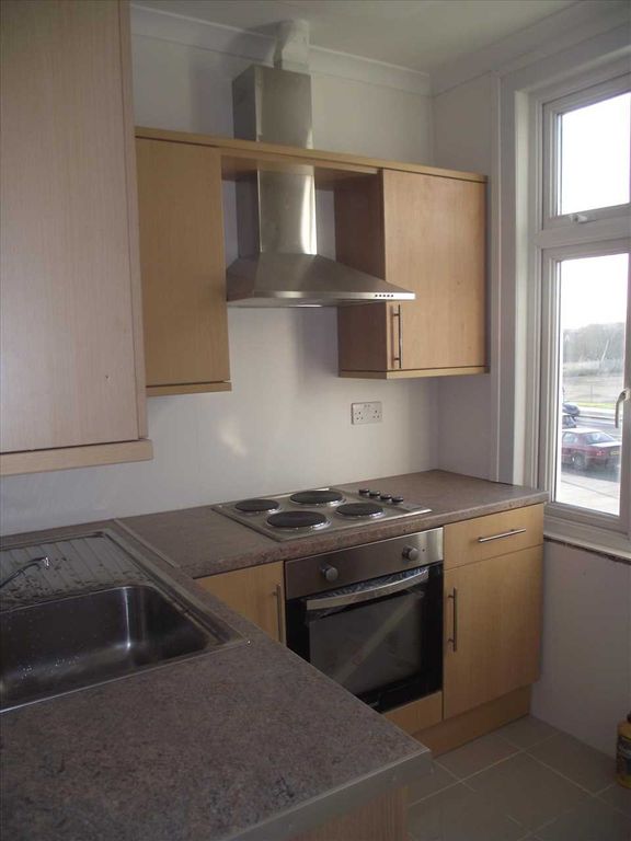 Property photo 3 of 12 Kitchen