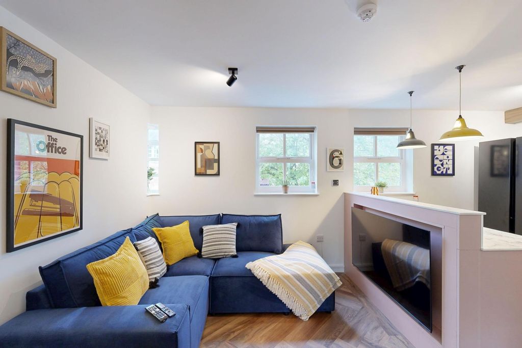 Property photo 2 of 17 Bright, Modern Living Room With A Comfortable Blue...