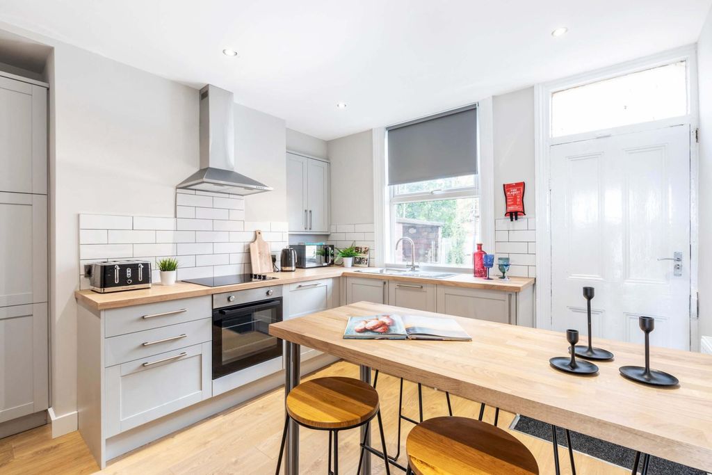 Property photo 1 of 11 Bright And Modern Kitchen With Ample Natural Light...