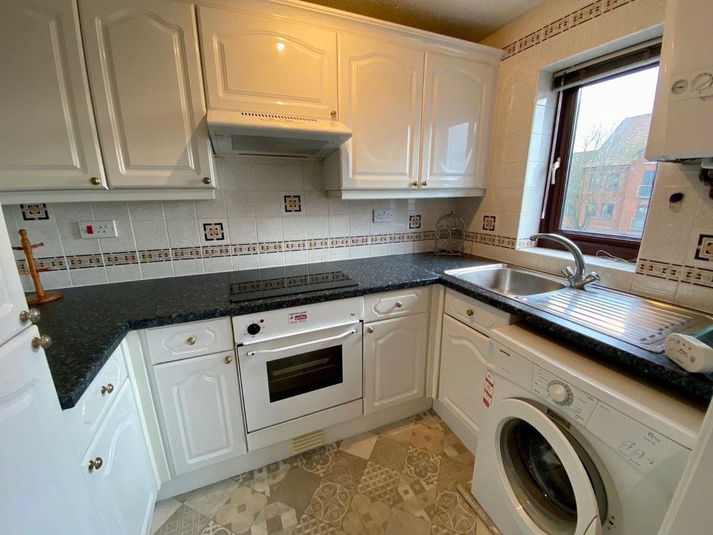 Property photo 3 of 6 Kitchen
