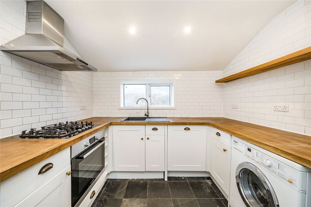 Property photo 2 of 12 Kitchen