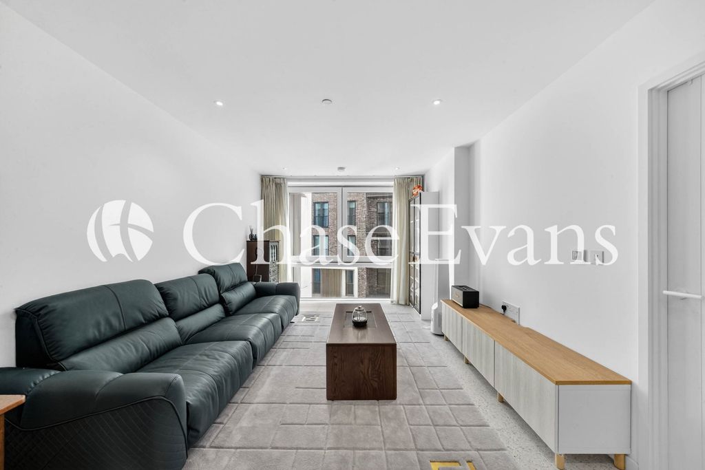 Property photo 3 of 21 Living Area