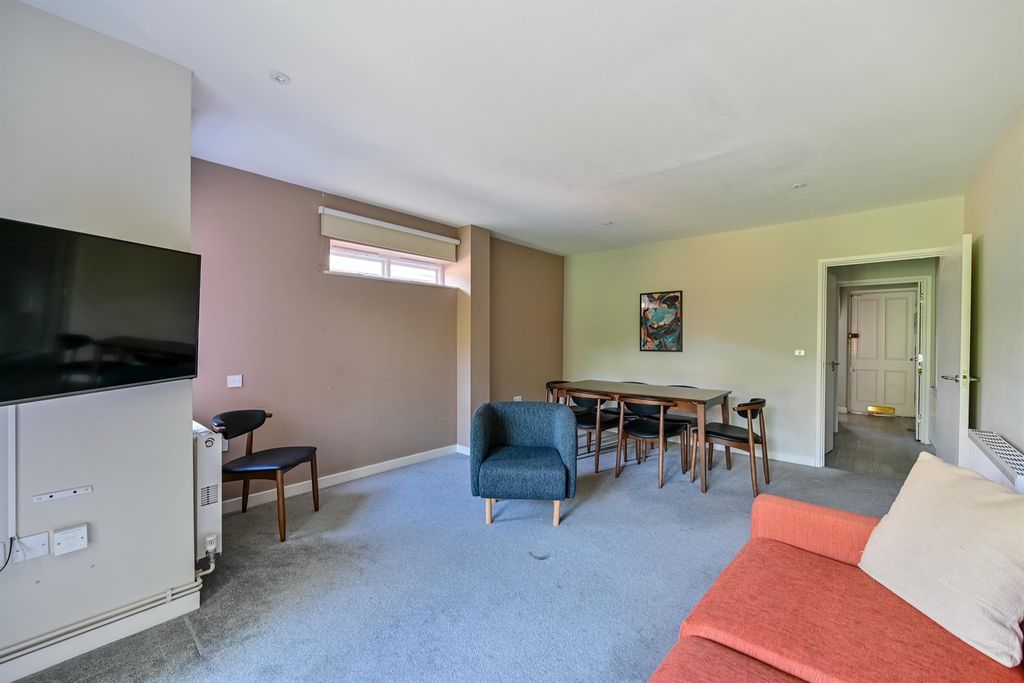 Property photo 3 of 12 Living Area